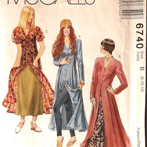 May include: McCall's sewing pattern featuring three women's fashion designs. The pattern includes a long, button-down coat, a dress with a floral print, and a long-sleeved dress. The pattern size is B (8, 10, 12).