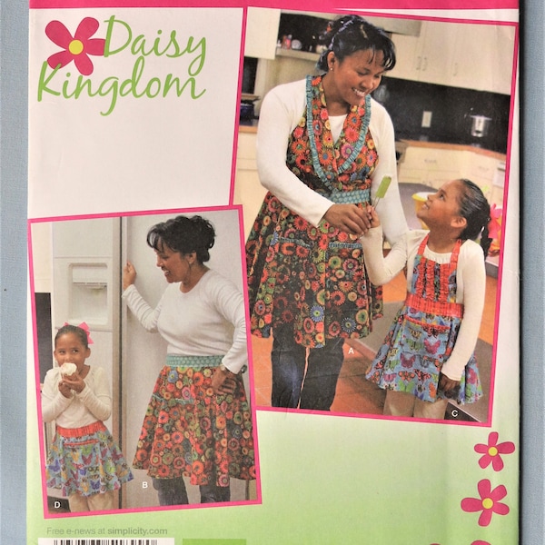 Simplicity 1899.  Apron pattern.  Daisy Kingdom adult and child apron pattern.  Half apron or Halter top full apron pattern.  Uncut