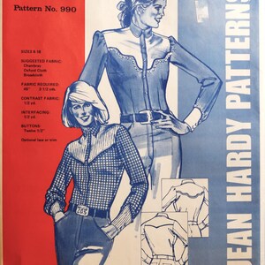 May include: A sewing pattern envelope for a shirt, Pattern No. 990 by Jean Hardy Patterns. The front features illustrations of two shirts with western-style yokes, long sleeves, and button-front closures. Text includes sizes 6-18 and fabric requirements.