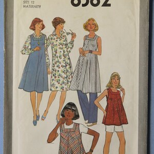 May include: Vintage Simplicity sewing pattern 8382 for maternity wear, size 12. The cover features illustrations of women in various outfits, including dresses and a tunic, in a retro style. The pattern includes a variety of designs for different looks.