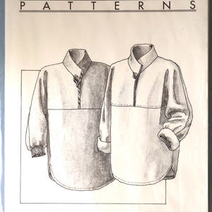 May include: A pattern for a Yukon Pullover, featuring two illustrations of the garment. The pattern is labeled "Great Copy Patterns" and includes the number #845. The pullover design has a collared neckline and long sleeves.