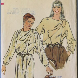 May include: Vogue Patterns sewing pattern 7918, size 10. The illustration shows a woman wearing a long-sleeved top with a bow detail and matching pants. The pattern includes the text "Vogue Patterns" and "$4.00".
