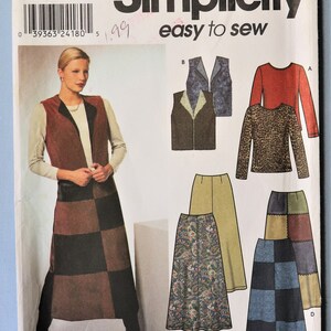 May include: A Simplicity 9328 sewing pattern envelope for sizes 16, 18, 20, and 22. The cover features illustrations of a long-sleeved top, a vest, and various long skirts with solid, leopard print, paisley, and color-blocked patchwork designs.