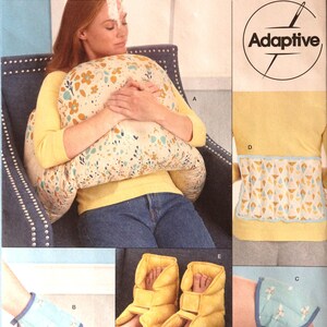 May include: Simplicity sewing pattern S9494, featuring adaptive designs. The image shows a woman holding a floral pillow, along with examples of sewn items: a waist apron, ankle supports, and foot warmers. The text "easy-to-sew" is also visible.