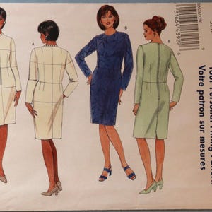 May include: A Butterick sewing pattern B5628 featuring illustrations of women's dresses. The pattern includes a variety of dress styles in different colors, including white, navy blue, and light green. The pattern size is 32W.