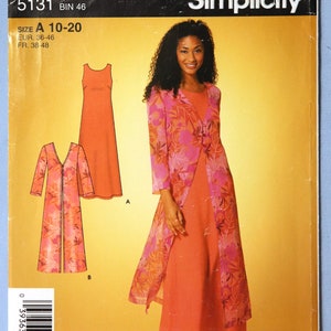 May include: Simplicity sewing pattern featuring a woman wearing a long orange dress with a floral print jacket. The pattern includes size options A 10-20. The package has the text "It's So Easy" and "Simplicity".