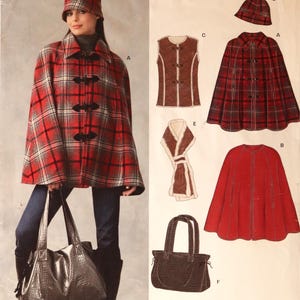 May include: New Look sewing pattern 6658 for sizes 8-18. The envelope features illustrations of a plaid cape, a solid red cape, a sleeveless vest with toggle closures, a scarf, a hat, and a tote bag with a textured crocodile-like finish.