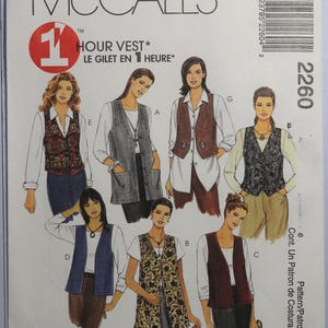 May include: McCall's 2260 sewing pattern envelope for a 1 Hour Vest. The front features illustrations of seven different vest styles in various colors and patterns, worn over white shirts and pants. Includes text: 1 Hour Vest, 2260.