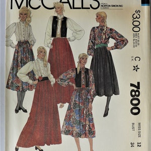 May include: A McCall's sewing pattern envelope for Miss Size 12, 34 bust, number 7800. The cover features illustrations of five outfits including long skirts, blouses with lace details, vests, and paisley prints. Text includes Made-For-You.