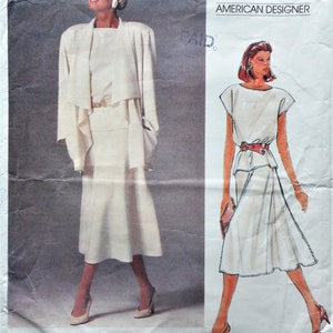 May include: Vogue Patterns sewing pattern featuring a John Anthony design. The cover shows a woman in a cream-colored skirt suit with a matching jacket and belt. The pattern number is 1387.