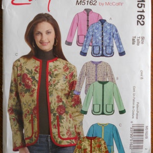 May include: A sewing pattern titled "Easy stitch'n save M5162 by McCall's." The pattern features a woman wearing a floral jacket with red trim. The pattern also shows jacket variations in pink, blue, lavender, green, and teal. The pattern includes size information.