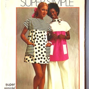 May include: Simplicity pattern 5467 for a super simple mini tent-dress or smock. The cover features two garments: a white mini dress with black polka dots and striped pockets, and a white top with a pink lower section and white pockets.