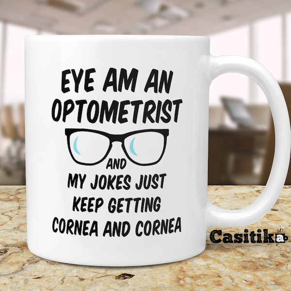 Optometry Mugs. Eye Doctor Ophthalmologist Mug. Eye Am An Optometrist My Jokes Keep Getting Cornea. Present Idea for Boss or Co-Worker.