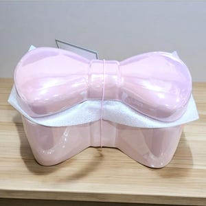 pink bow candle