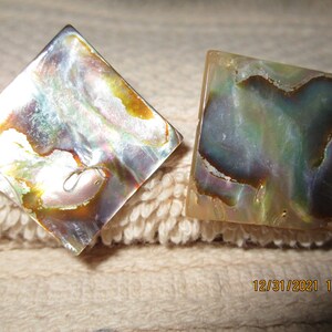 Pretty square stud earrings with  paint designs.