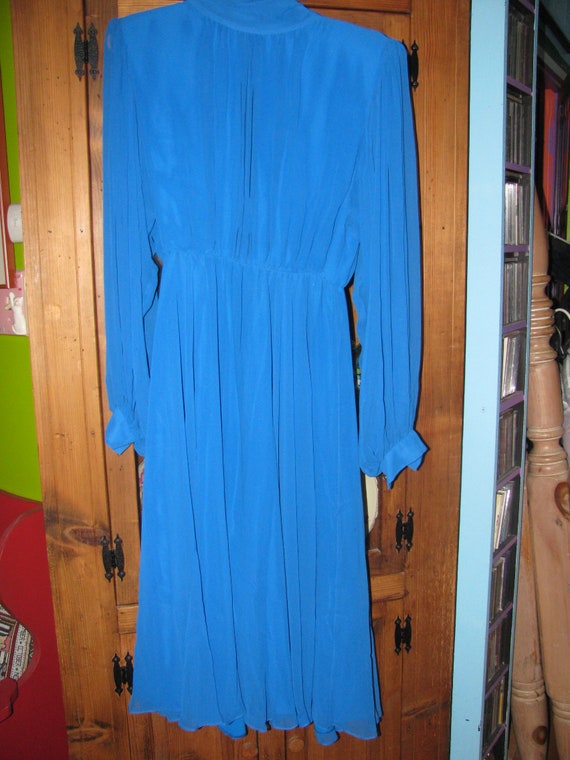 Ocean blue deceptively alluring dress. - image 1