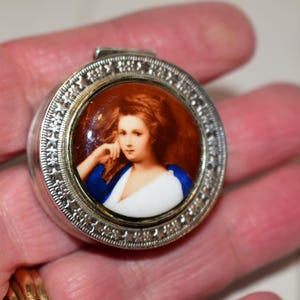 May include: A rectangular wooden sign, distressed in appearance, bearing the handwritten text "Welcome to our home". The sign is designed for home decor, with a welcoming message. The style suggests a rustic or farmhouse aesthetic.