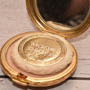 Portacipria vintage Revlon: Van Cleef & Arpels Moon Drops dorati