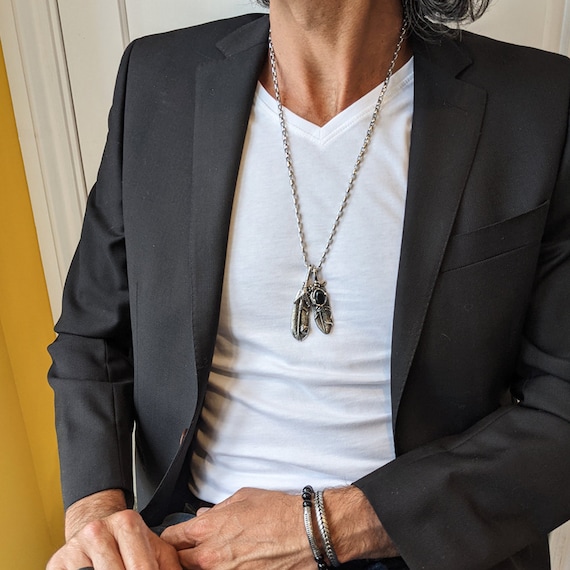 Collana in acciaio argentato con artiglio e piuma | Disponibile! | Fort Collana in acciaio argentato con artiglio e piuma | Disponibile! | Fort
