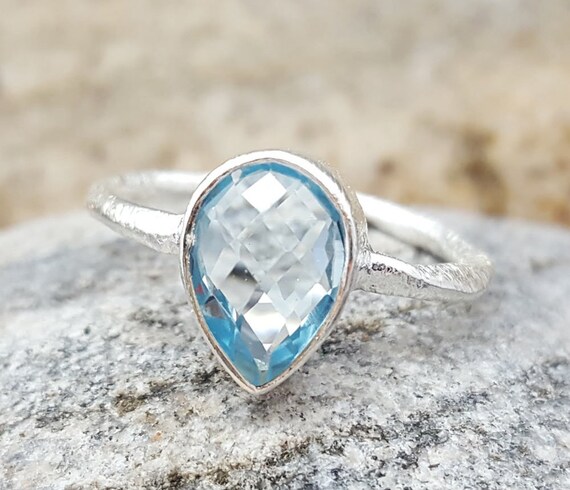 Teardrop blue topaz ring deals