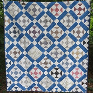 Blue and White Antique Churn Dash Quilt Top Quilted and Completed