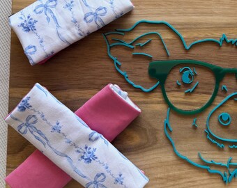 Fundas reversibles para arnés Pavlik - 7 unidades - lazos rosas, blancos y azules
