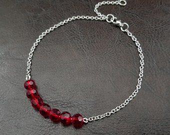 Bracelet chaîne en acier inoxydable serti de perles de verre de couleur rouge foncé