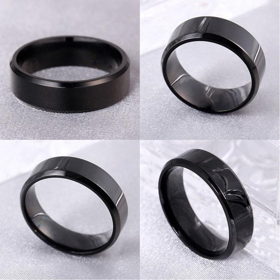 Anillo negro de acero inoxidable para hombres y mujeres - Etsy España