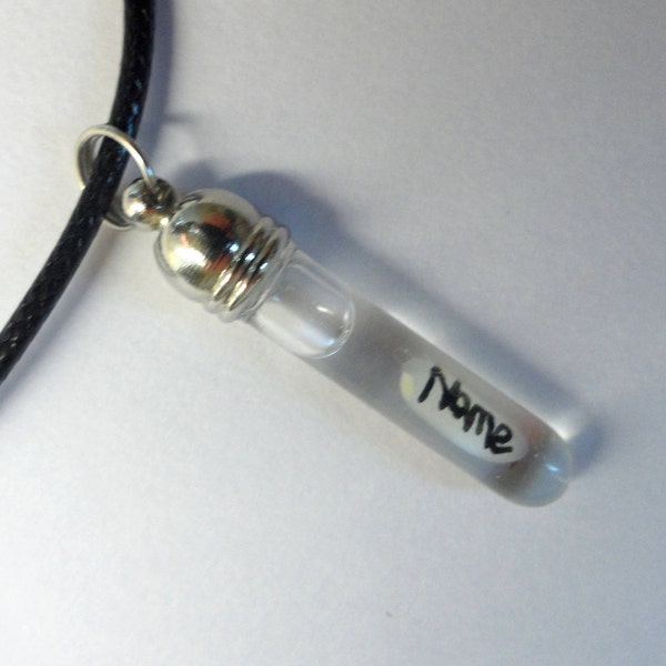 Personalised name on a rice grain necklace, pendant. Minimalist jewellery.