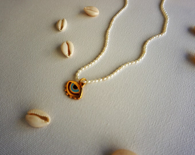 Tiny natural fresh pearl necklace with gold plated evil eye