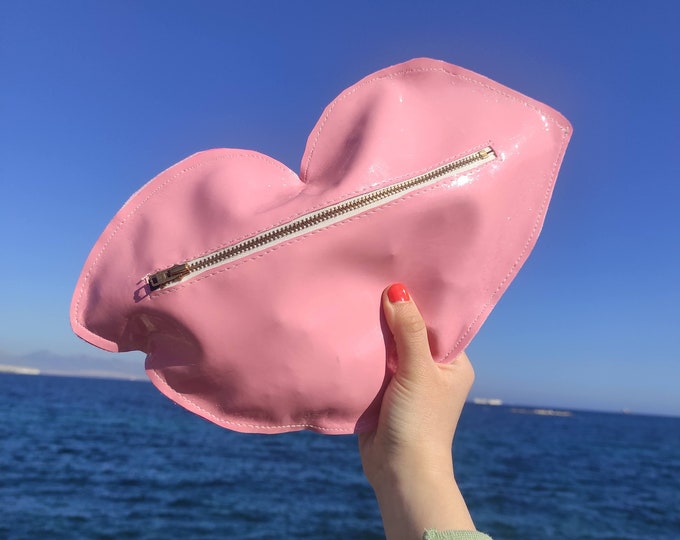 Pink vinyl lip shaped pouch