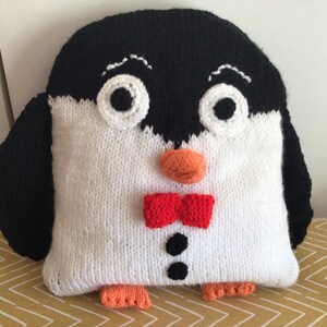 Knitted penquin cushion or toy