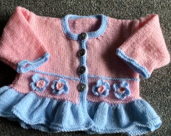 Hand knitted baby girls cardigan