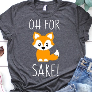 May include: Gray t-shirt with a white graphic of a cartoon fox and the text "OH FOR SAKE!"