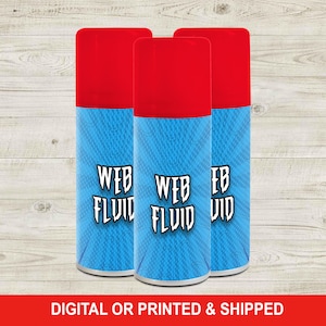 May include: Three cylindrical containers with red caps and blue bodies. The blue bodies have a web-like pattern and the words "WEB FLUID" in white. The bottom of the image has the text "DIGITAL OR PRINTED & SHIPPED".