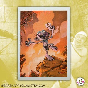 May include: A cartoon illustration of a small, light-skinned creature with large eyes and a wide smile, standing on a rocky ledge. The creature is wearing a loincloth and holding a small, glowing object in its hand. The background is a warm orange and yellow color, with a cave opening in the upper left corner.