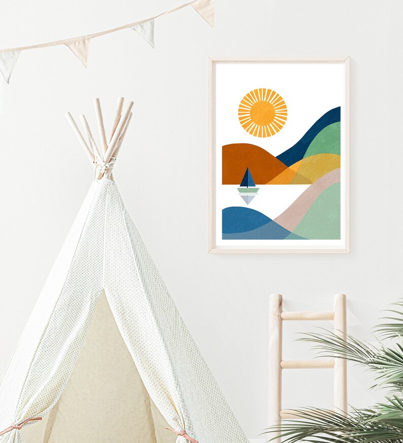 May include: A framed abstract print of a stylized landscape with a sun, hills, and a sailboat on a body of water. The colors are blue, green, yellow, orange, and brown.