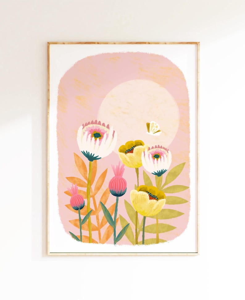 May include: A framed print with a pink background and a large white circle in the center. The circle is surrounded by a variety of flowers in shades of pink, yellow, and green. A small white butterfly is flying above the flowers.
