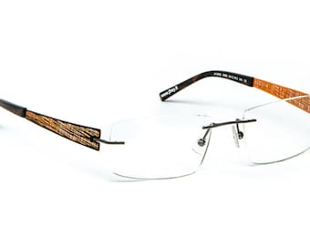 Lunettes de vue percées rectangulaires en métal découpé au laser noir et orange Homme Créateur français JF REY JF2562, modèle déposé, neuf