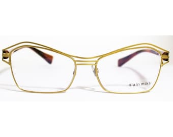 Lunettes de vue / Monture optique Femme Bimatière Metal et acetate ALAIN MIKLI AL1113 Jaune et Marron Fabriqué à la main en France