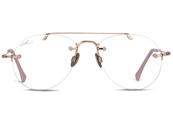 Lunettes de vue aviateur percees en acier or dore et titane Createur Willems Germany Monture optique pilote Femme fabrique en Allemagne Etsy France