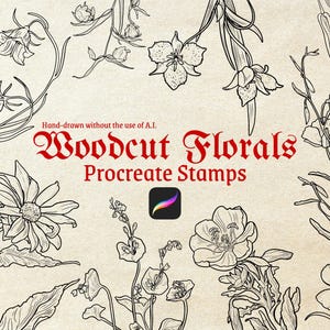 May include: A set of three ceramic mugs with a speckled, cream-colored glaze. Each mug features a different hand-painted design: a blue and green leaf, a yellow flower, and a red berry. The mugs have a simple, rounded shape.