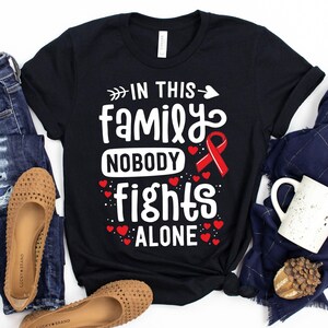 In This Family Nobody Fights Alone T-Shirt / Blood Clot Awareness / Nobody Fights Alone / In This Family / PE Awareness / Pulmonary