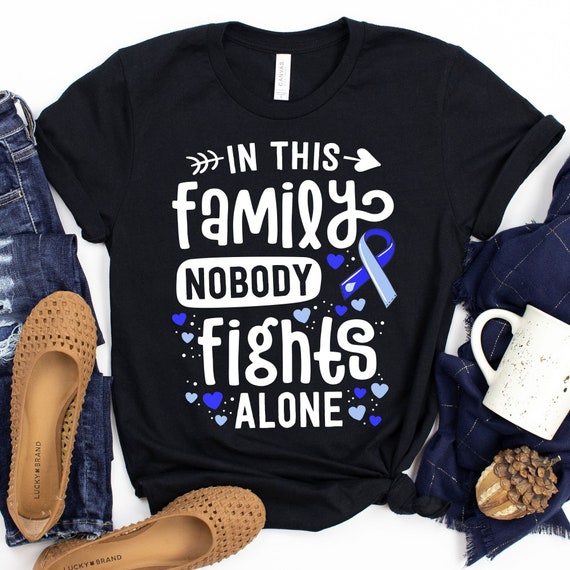 En esta familia nadie lucha solo camiseta Hydro Awareness En esta familia Nadie lucha solo Hydro Warrior Hydrocephalus Aware Etsy Mexico