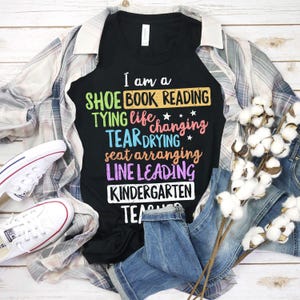 I Am A Shoe Tying Book Reading Life Changing Tear Drying Seat Arranging Line Leading Kindergarten Teacher Shirt Best Teacher Teacher Team