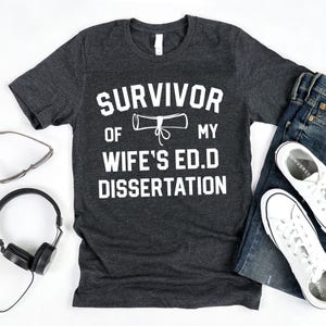 Survivor Of My Wife&#39;s Ed.D Dissertation T-Shirt / Doctor of Education / PhD Husband Shirt / Gift For Him / Grad School / EdD Graduation