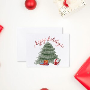 プレゼントとハッピーホリデーが入ったクリスマスツリー。中が空白なので、自分のメッセージを書き込めるクリスマスカードです。