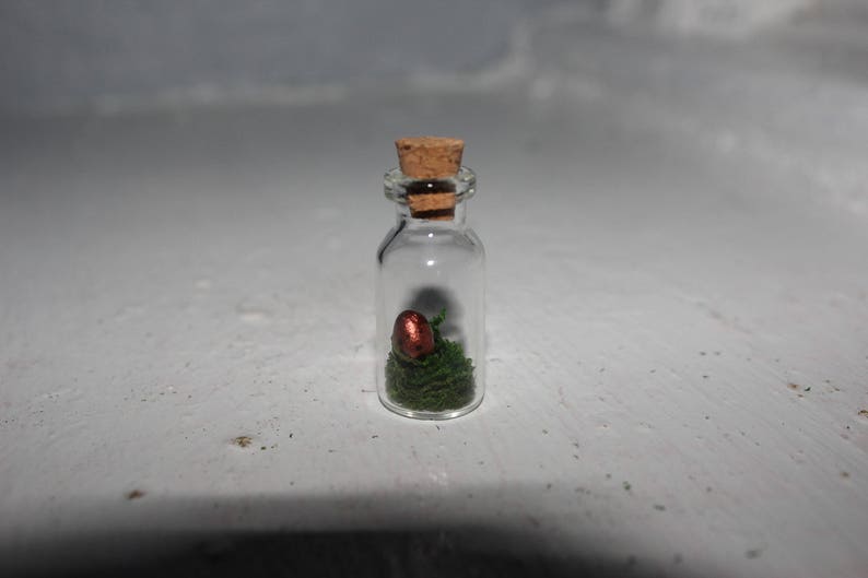 Miniature dragon/'s egg in glass bottle
