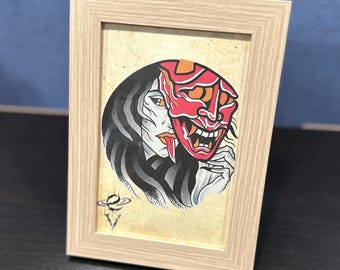 Demon Mask Lady Framed Print