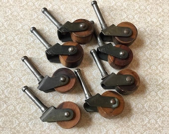 Juego de 8 ruedas giratorias de madera estilo vintage con vástagos metálicos, ideales para la restauración de muebles y como repuesto para muebles antiguos.
